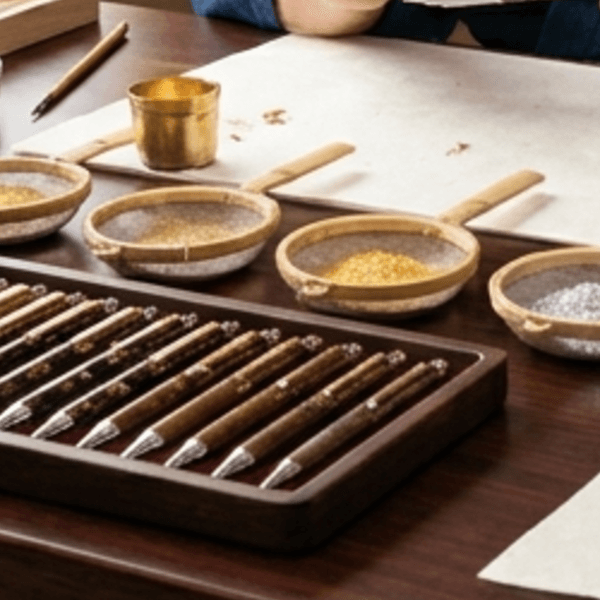 Graded gold and silver powders in bamboo sieve-dishes